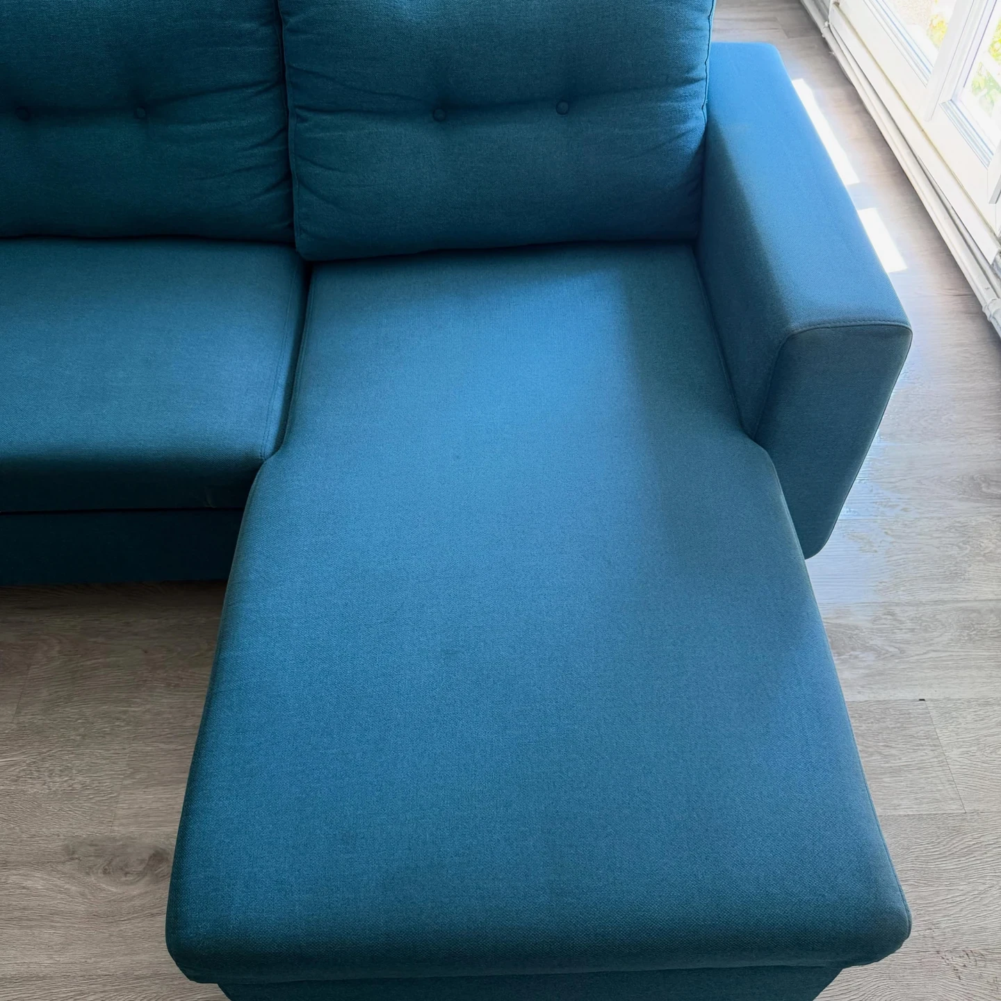 Canapé bleu · méridienne après nettoyage